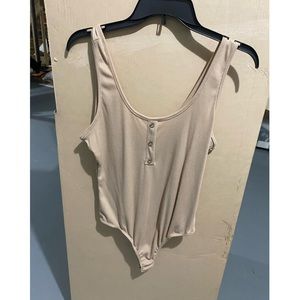 Tan women’s body suit size L
